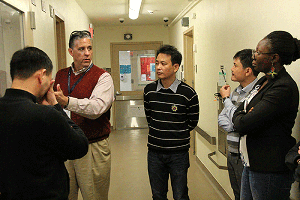 Ben Fontes, Yale's Biosafety Officer, points out features of a containment lab to professionals from countries developing biosafety programs.